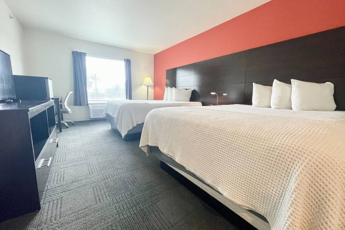 standard room, 2 queen beds, non smoking, kitchenette | individually decorated, individually furnished, desk, laptop workspace