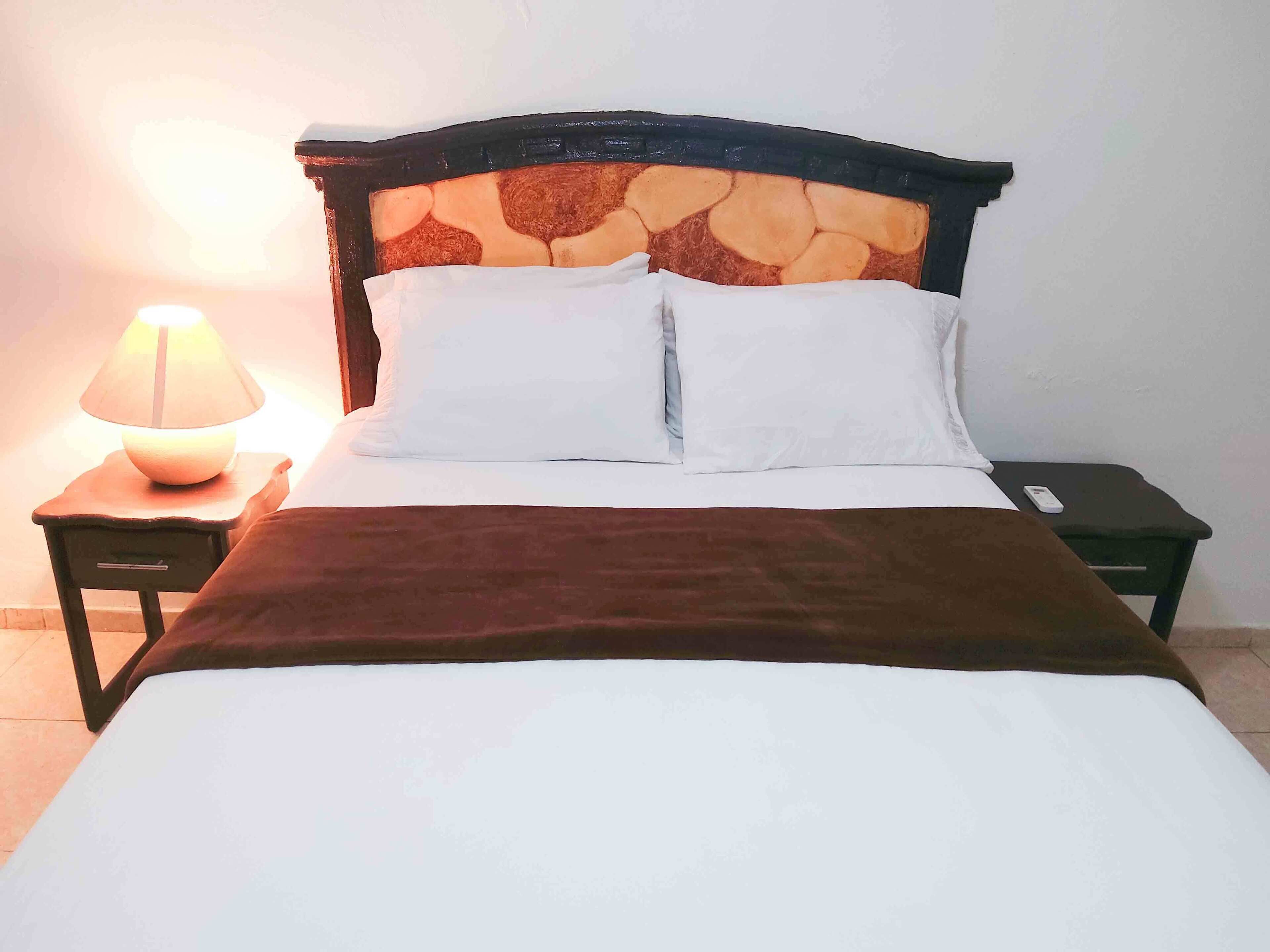 Biancheria da letto di alta qualità, una cassaforte in camera