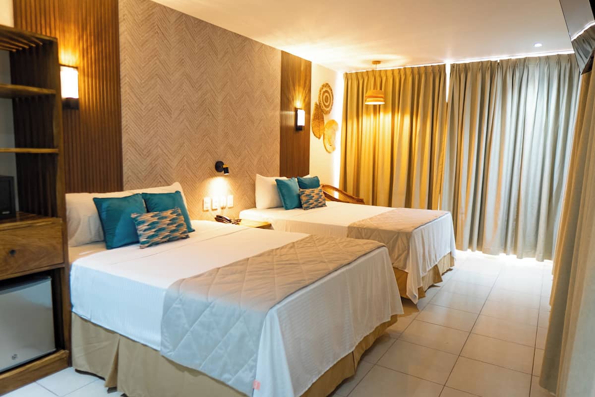 Habitacion Deluxe Segundo nivel | Desk, laptop workspace, blackout curtains, free WiFi