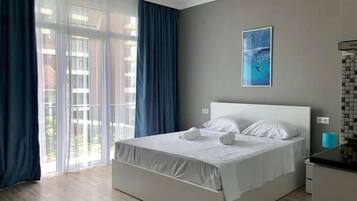 Habitación doble estándar | 1 habitación, tabla de planchar con plancha, wifi gratis y ropa de cama