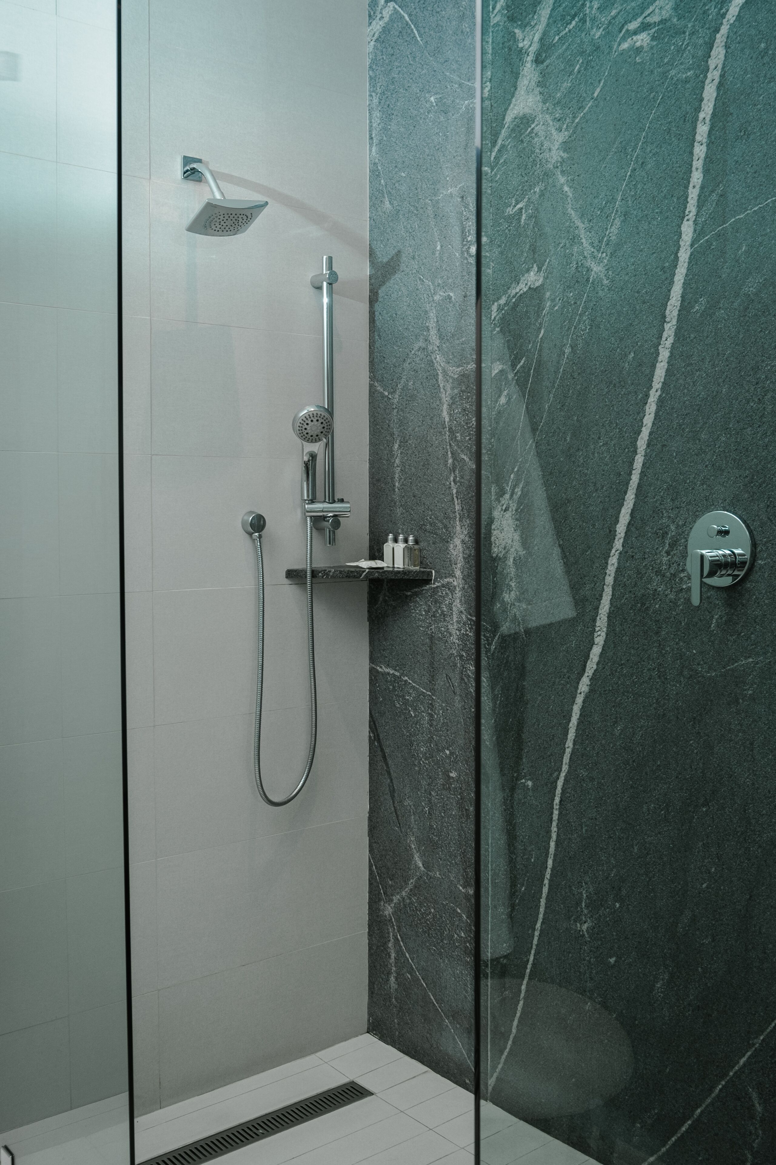 shower, rainfall showerhead, designer toiletries, hair dryer