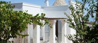 Complex of trulli with private pool overlooking the sea - Pet Friendly