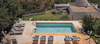 Complex of trulli with private pool overlooking the sea