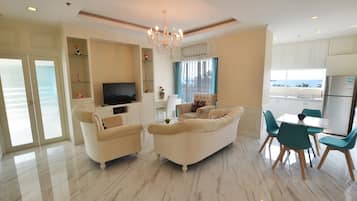 Apartamento superluxo | Área de estar | TV LED
