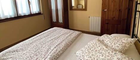 1 bedroom, desk, iron/ironing board, travel cot