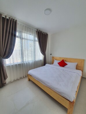 Chambre Double Deluxe | Chambres insonorisées, Wi-Fi gratuit, draps fournis