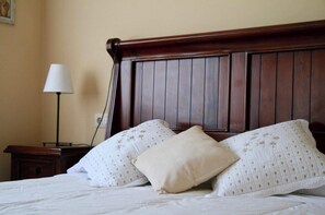 1 bedroom, desk, iron/ironing board, travel crib