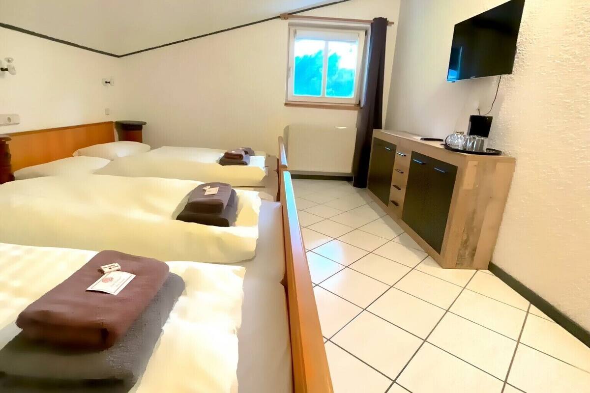 Quadruple Room | 2 bedrooms, bed sheets