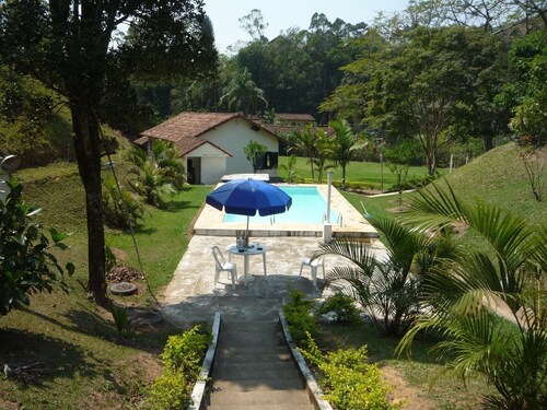 8 bedrooms, main house and guest house, 5 bathrooms, swimming pool, games room, barbecue area.....