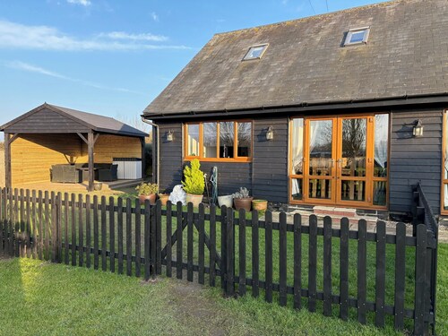 Quiet setting with secure gated parking, children's play area & farm animals