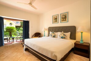 Deluxe Room | Minibar, in-room safe, individually furnished, desk - Coconut Grove Beach Resort (Betalbatim)