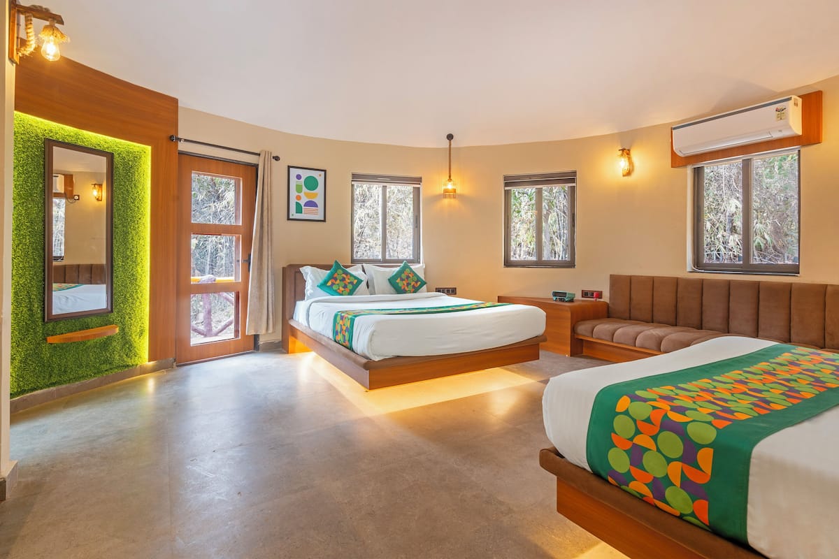 Deluxe Rooms with Balcony and Forest View | Individually furnished, desk, blackout curtains, iron/ironing board