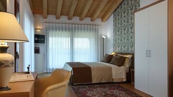 Doppia Superior | Minibar con snack e bevande gratuite, una cassaforte in camera