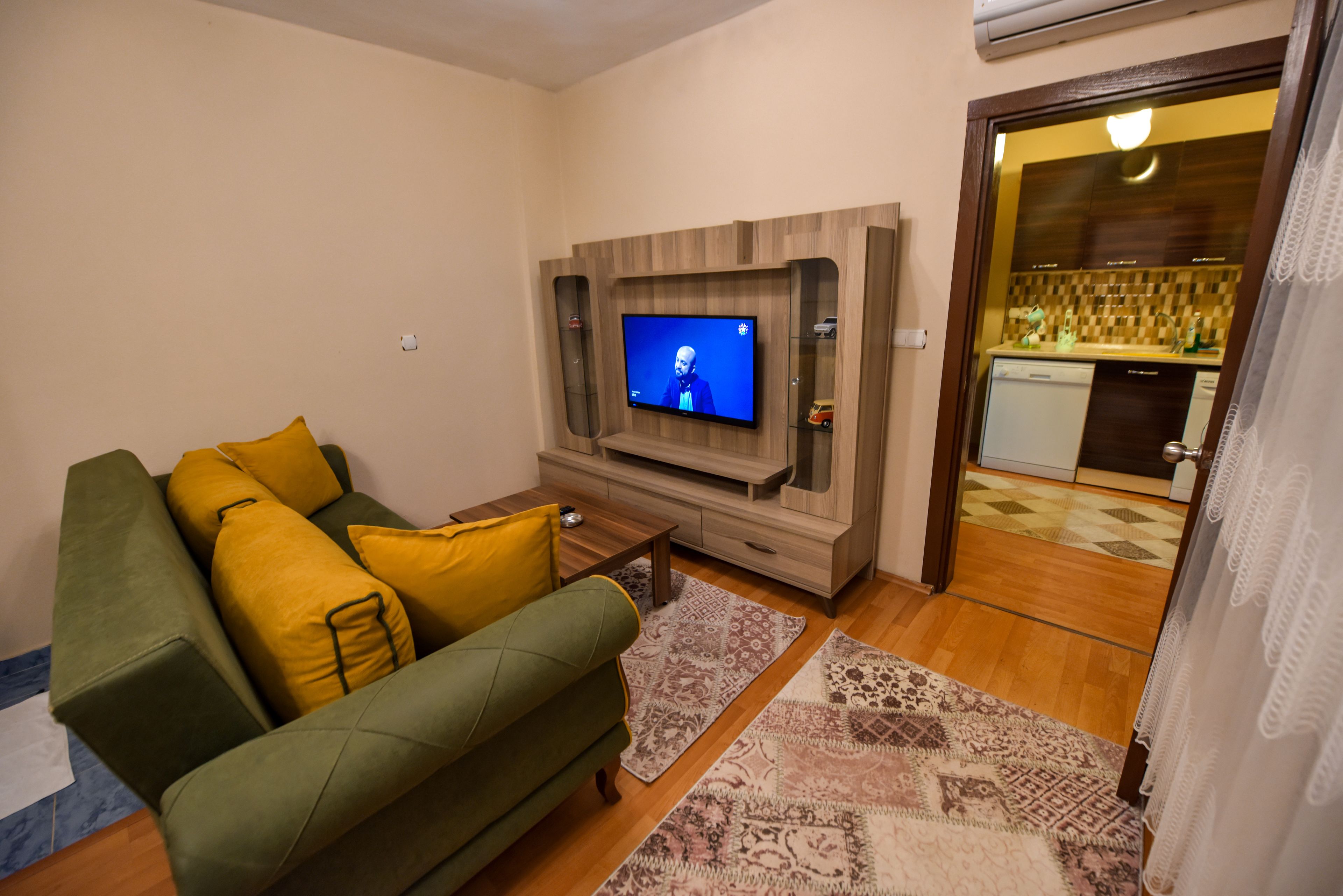 studio suite, kitchenette | living area | lcd tv