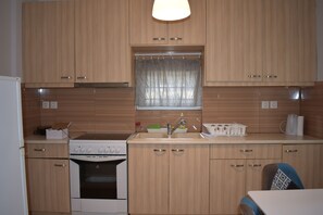 Apartment | Private kitchen | Fridge, oven, stovetop, coffee/tea maker - Cozy Apartment In Central Athens (Kaisariani)