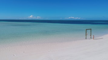 On the beach, beach towels
