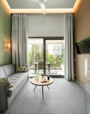 Two Storey Suite | Living room | 43-inch Smart TV with satellite channels, TV - Eco Green Residences & Suites (Sithonia)