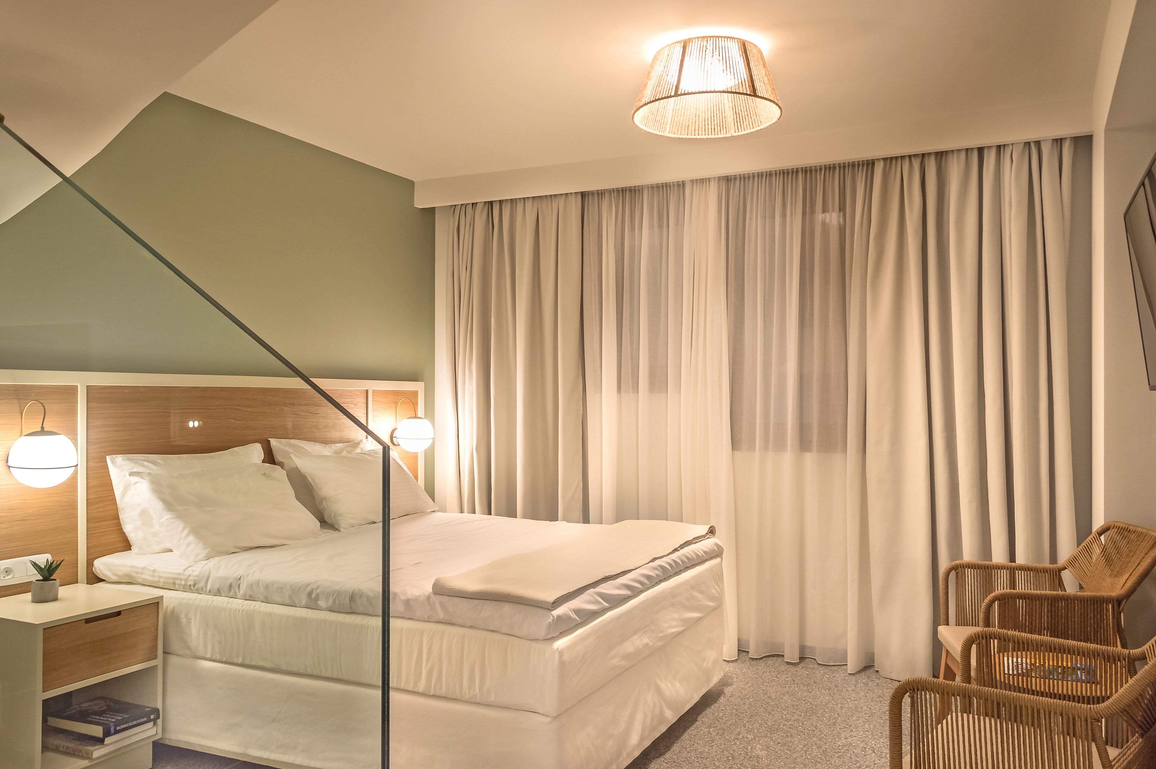 Pillow-top beds, in-room safe, blackout curtains, soundproofing