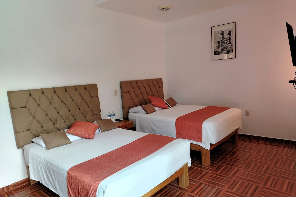 Family Room | 2 bedrooms, in-room safe, individually furnished, desk