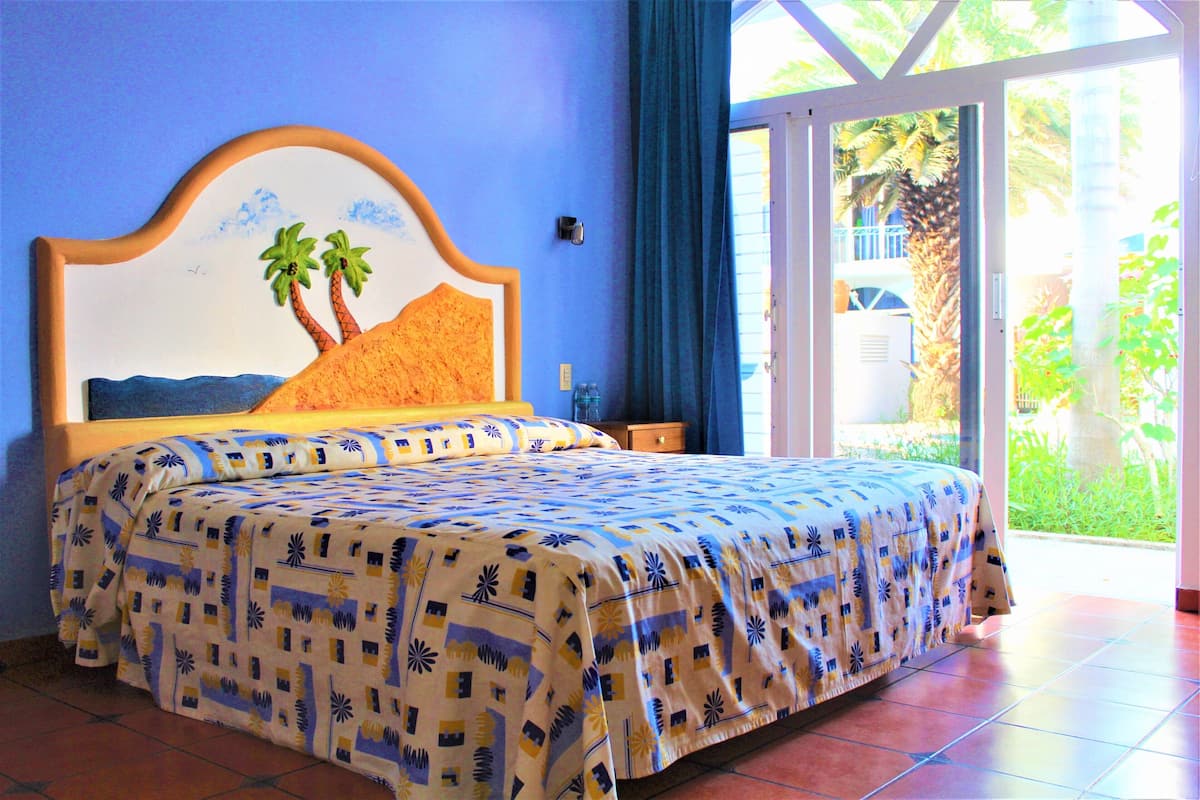 Standard Room | 2 bedrooms, in-room safe, individually furnished, desk