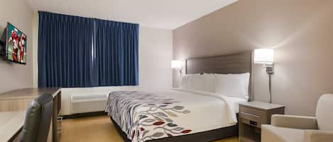 1 dormitori, espai de treball apte per a portàtils i cortines opaques