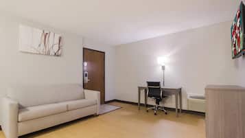 Laptop workspace, blackout drapes, cribs (free), WiFi (free)