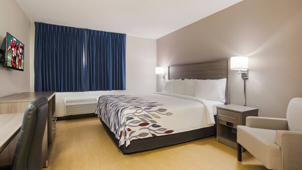 Laptop workspace, blackout drapes, cribs (free), WiFi (free)