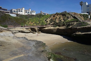 On the beach, sun loungers, beach towels