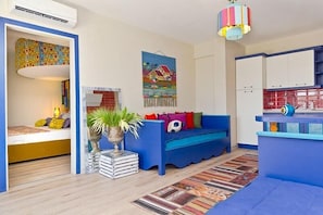 Elite-Villa | Wohnbereich | 40-Zoll-LED-Fernseher mit Satellitenempfang, Fernseher