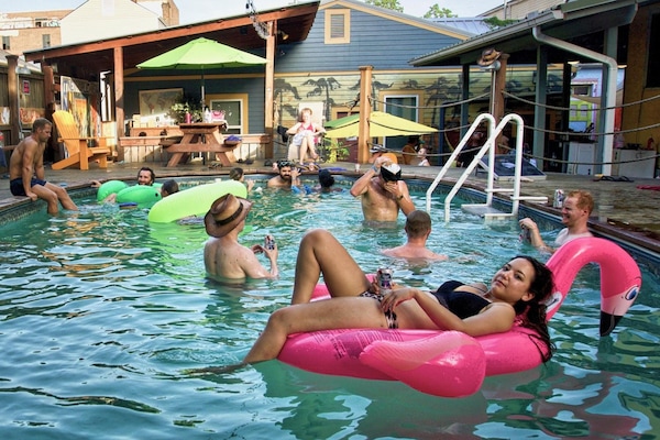 Outdoor pool, open 10:00 AM to 10:00 PM, pool umbrellas, sun loungers