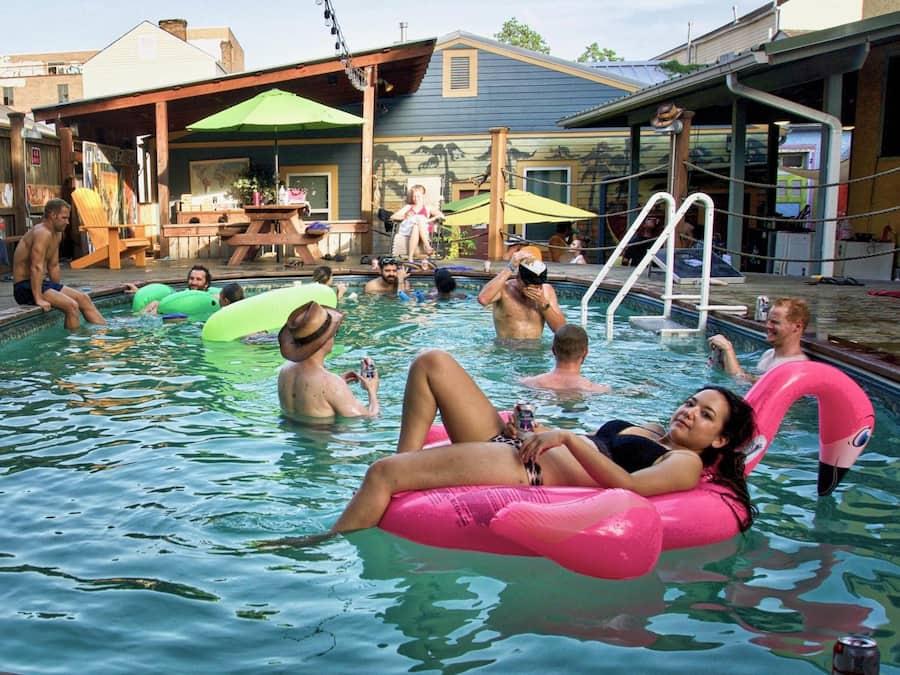 Outdoor pool, open 10:00 AM to 10:00 PM, pool umbrellas, pool loungers