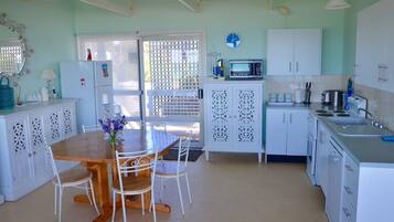 Coffee/tea maker, fridge, microwave, oven