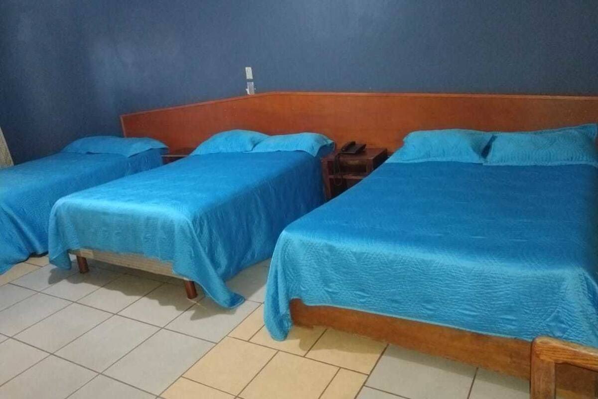 Family Room, Multiple Beds | Iron/ironing board (on request), WiFi (free), bed sheets