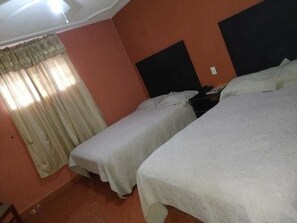 Quadruple Room | Iron/ironing board, free WiFi, bed sheets - Hotel Posada del Rey (Matamoros)