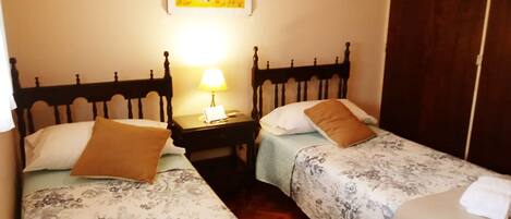 Apartment, 1 Bedroom, City View | 1 bedroom, blackout drapes, iron/ironing board, free WiFi