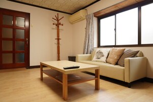 Casa (Private Vacation Home) | Zona de estar | Una televisión de pantalla plana
