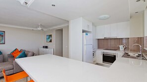 Fridge, microwave, stovetop, cookware/dishes/utensils