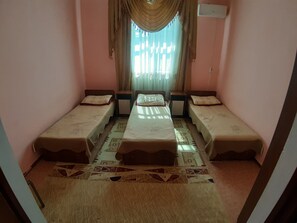 Shared Dormitory, Mixed Dorm, Shared Bathroom (3 Beds) | Premium bedding, down comforters, iron/ironing board, free WiFi