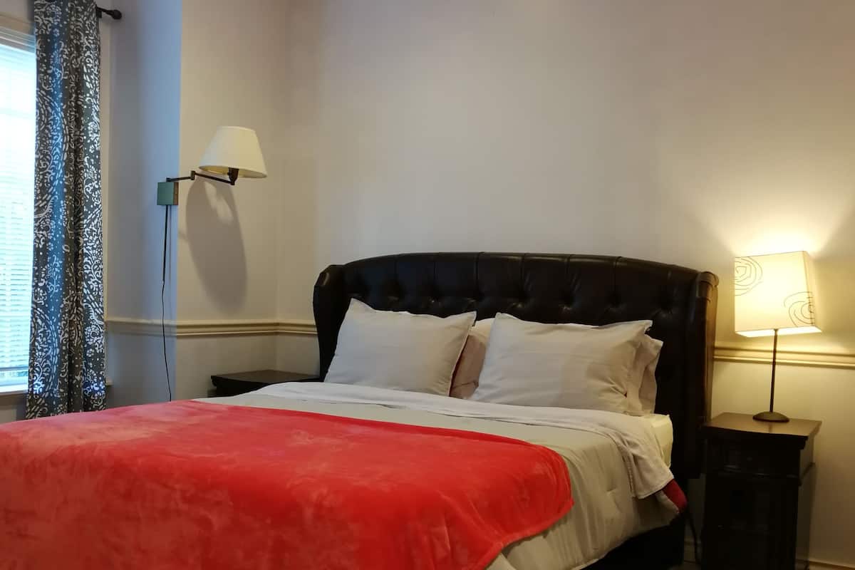 Premium bedding, blackout curtains, free WiFi, bed sheets
