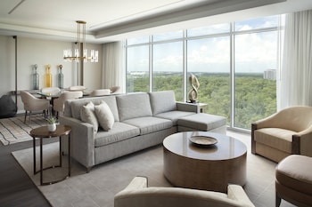 Luxury Suite, 1 Bedroom, Balcony | Living room | 55-inch LCD TV with satellite channels, TV, table tennis at JW Marriott Orlando Bonnet Creek Resort & Spa