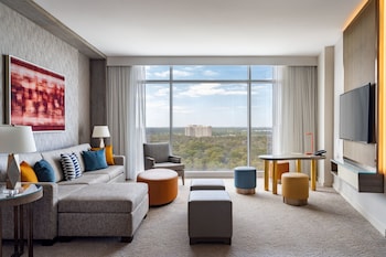 Family Suite, 2 Bedrooms | Living area | 55-inch LCD TV with satellite channels, TV, pay movies at JW Marriott Orlando Bonnet Creek Resort & Spa