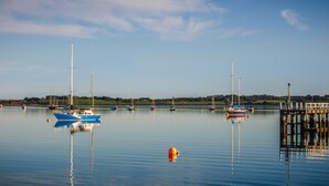 A calm harbor with several sailboats anchored. - Sky Mirror Cottage - sleeps 9 (RHYLL)