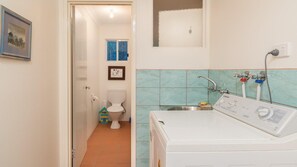 Banheira, toalhas de banho