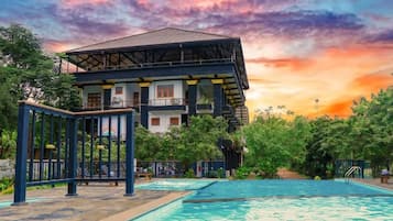 Outdoor pool, open 8:00 AM to 8:30 PM, pool loungers