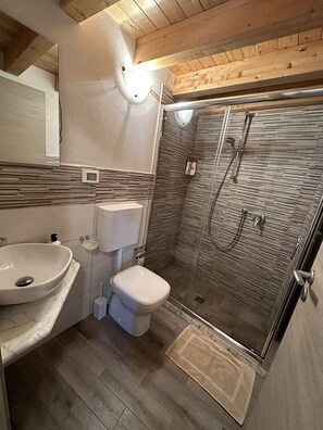 Eco-friendly toiletries, hair dryer, towels, soap