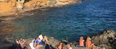 On the beach, beach towels