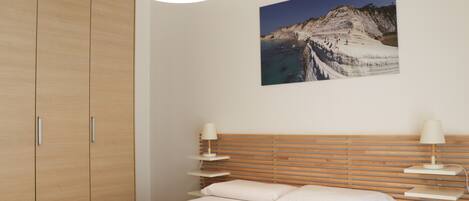 1 غرفة نوم ومكواة/لوح كي وواي فاي مجانًا وملاءات أسرّة