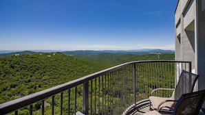 A balcony with a view of a mountainous landscape. - Top Floor 2B Condo w/ Pool Access! (Sugar Mountain)