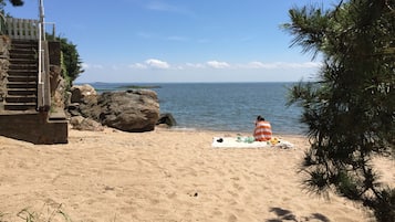 On the beach, sun-loungers, beach towels