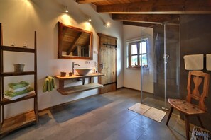 Bathtub, hair dryer, towels, soap